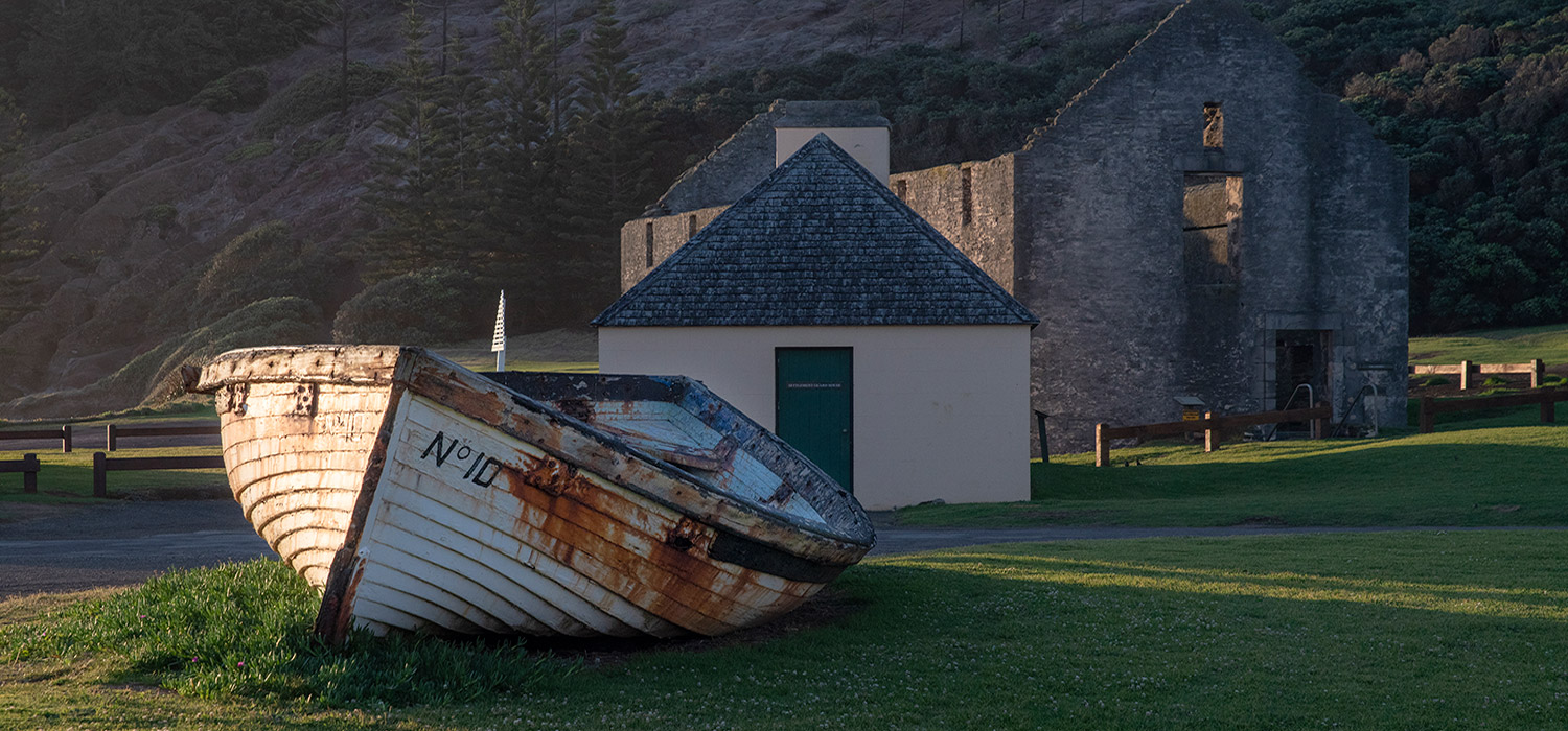 Old Boat and buildings in Kingston Bay