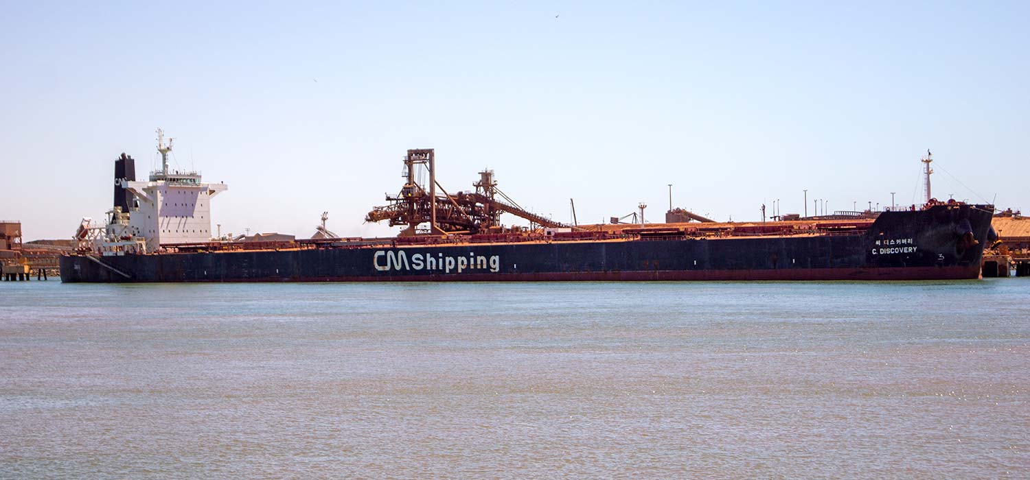 Iron ore ships being loaded at Dampier