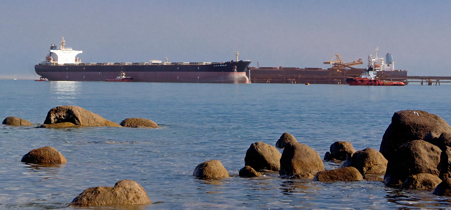 Iron ore ships being loaded at Dampier