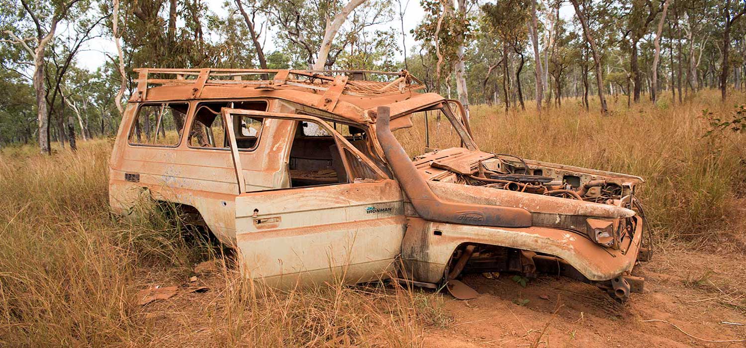 Rolled troopcarrier on the track to Weipa