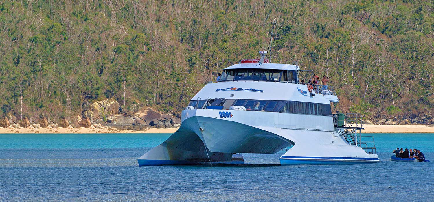 Sailing boat moored at Whitehaven beach 